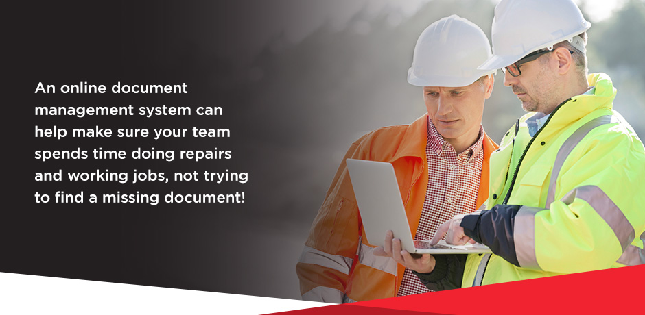 Two people looking at a laptop